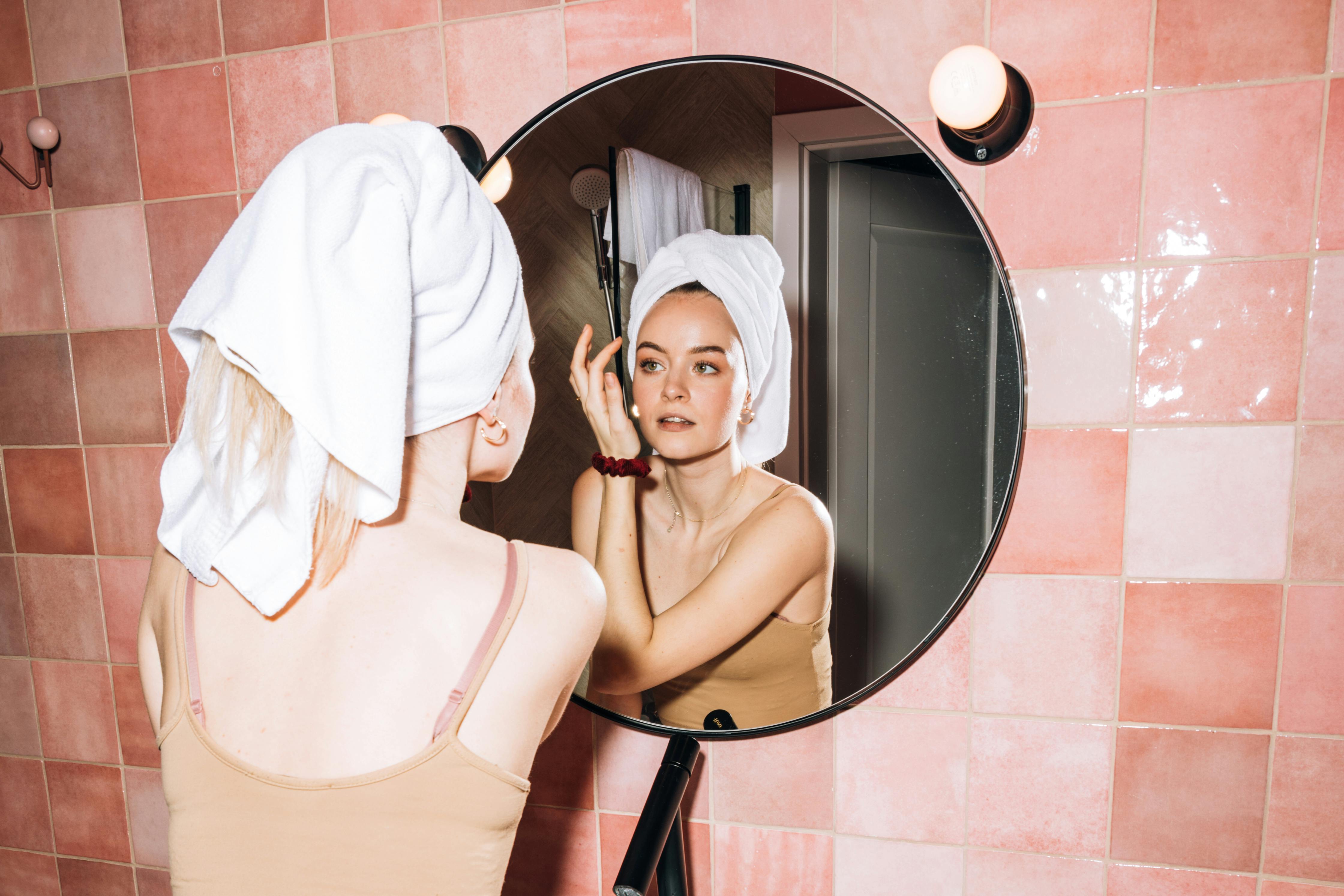 Woman applying serum